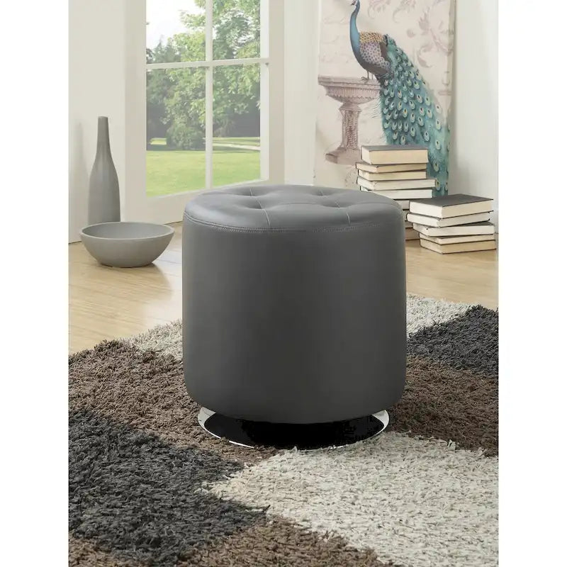 Pouf rotondo rivestito in similpelle