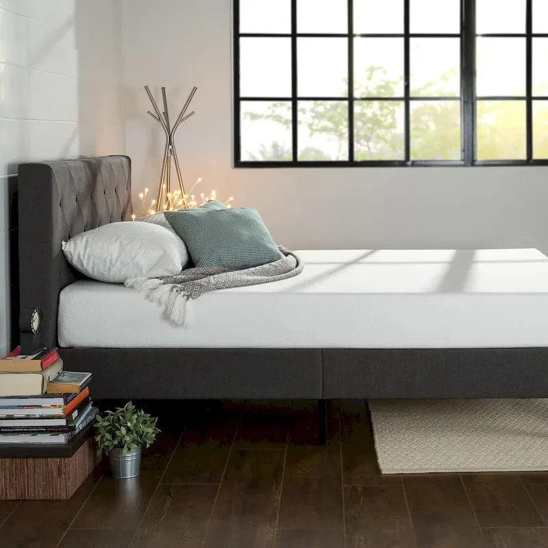 Letto a piattaforma imbottito grigio scuro con cuciture a rombi